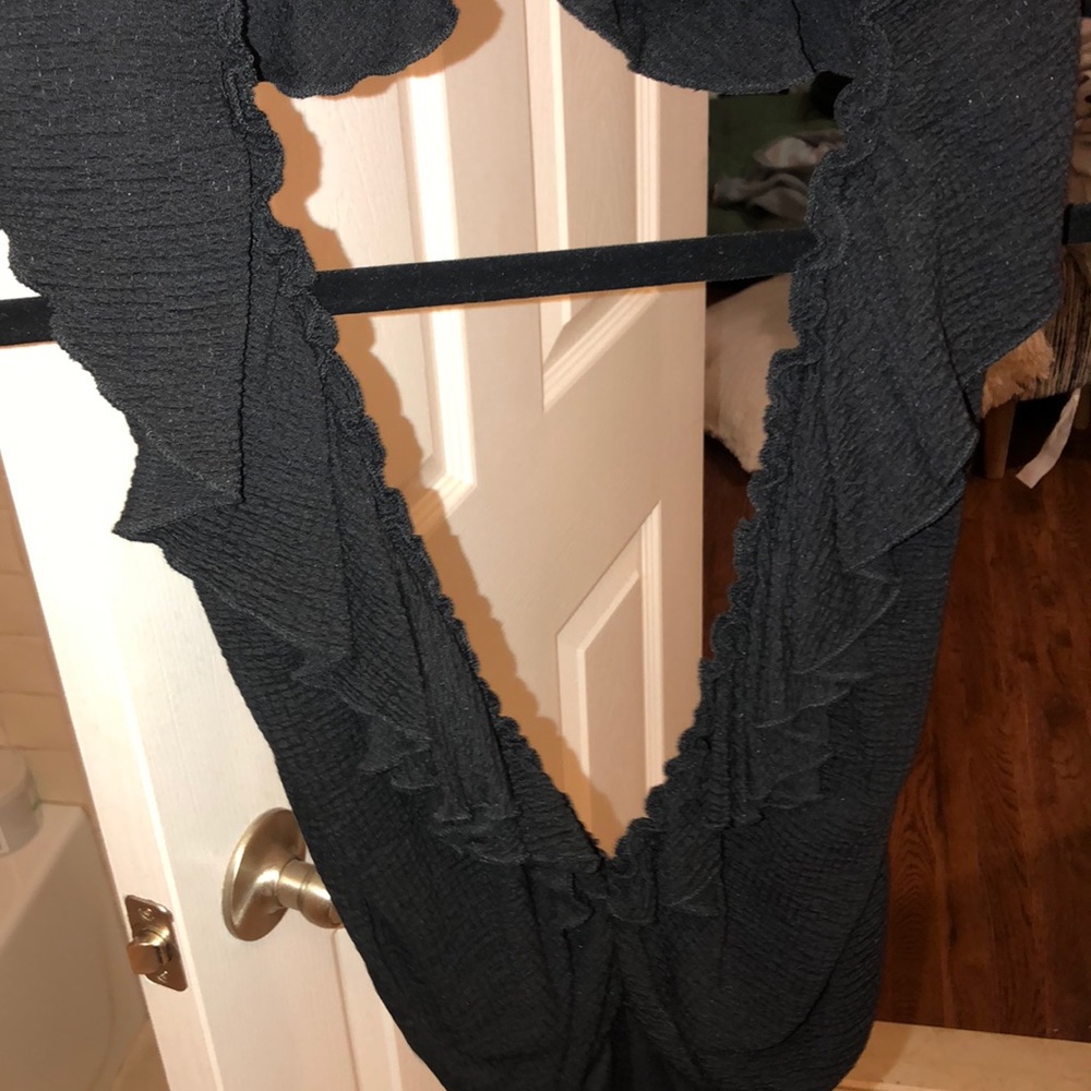 Plunging ruffle bodysuit with completely open back